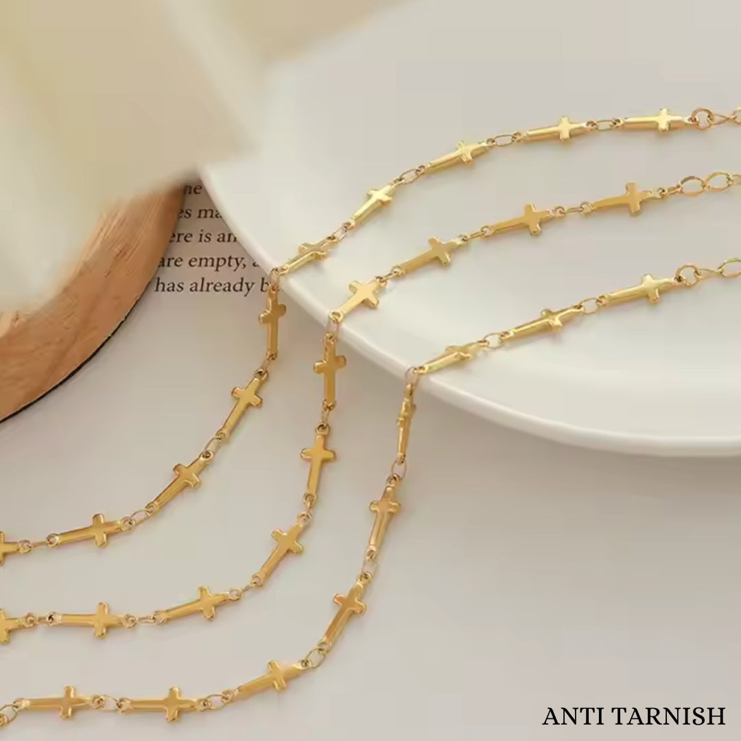 Gold cross bracelet